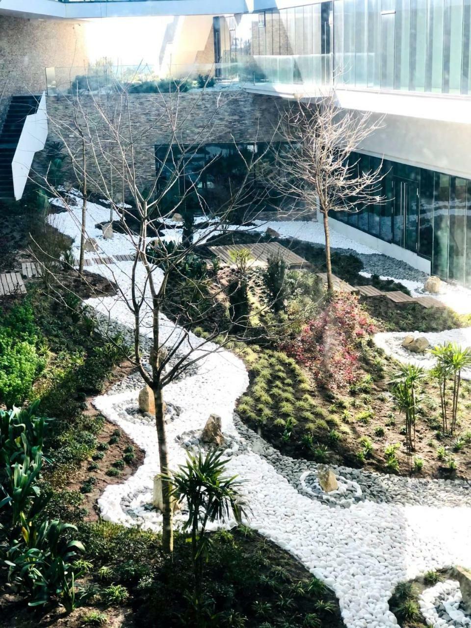 Royal Obidos Scenic Resort Praia del Rei Exteriör bild The waterfall at the entrance of the building